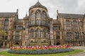 University of Glasgow,  building on Gilmorehill, Hunterian Museum, Bute Hall, Concert Hall, Visitor Centre with colorful flowers Royalty Free Stock Photo