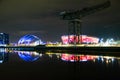Glasgow Armadillo SECC and Hydro and Clydeport crane illuminated at night