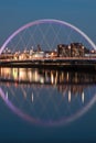 The Clyde Arc reflected in the Clyde River at night, portrait view Royalty Free Stock Photo