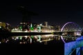 Finnieston Crane and The Clyde Arc illuminated at night. Banks of the River Clyde Royalty Free Stock Photo
