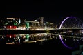 Hilton and The Clyde Arc illuminated at night. Banks of the River Clyde Royalty Free Stock Photo