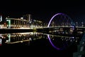 Hilton and The Clyde Arc illuminated at night. Banks of the River Clyde Royalty Free Stock Photo