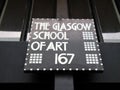 Close up of sign at the entrance to the Glasgow School of Art building, designed by architect Charles Rennie Mackintosh.