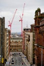 Glasgow, UK, February 4th 2023, Tall cranes at new office construction in Glasgow city centre Royalty Free Stock Photo