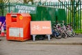 Glasgow, UK, May 6th 2023, Bikes and clothing recycling containers and signs