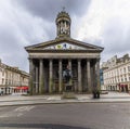 GLASGOW, UK - May , 2021: A view towards the Galley of Modern art and the statue of the Duke of Wellington in Glasgow