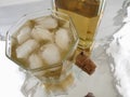 Glass of Alcohol with bottle and cork Royalty Free Stock Photo