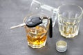 Glass with alcohol and car keys Royalty Free Stock Photo