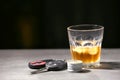 Glass with alcohol and car keys Royalty Free Stock Photo