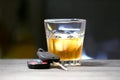 Glass with alcohol and car keys Royalty Free Stock Photo