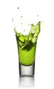 Glass of alcoholic drink with ice. Absinthe or mint liquor shot Royalty Free Stock Photo