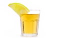 Glass of alcoholic drink with lemon, distilled from sugar cane, called in Brazil Royalty Free Stock Photo