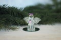 Glass angel decoration and Christmas tree branch Royalty Free Stock Photo