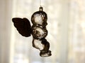 Glass Angel in front of Window Royalty Free Stock Photo