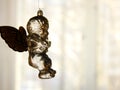 Glass Angel in front of Window Royalty Free Stock Photo