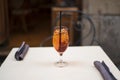 Glass of Aperol Spritz cocktail on the table in a terrace of restaurant Royalty Free Stock Photo