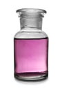 Glass apothecary bottle with purple liquid sample isolated. Laboratory analysis