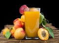 Glass apricot juice and fruits black isolated.