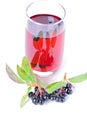 Glass of aronia juice with berries