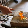 Glass Artist in her workshop making glassware Royalty Free Stock Photo