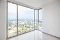 The glass balcony overlooks the sea.