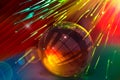 Glass ball against fiber optic background Royalty Free Stock Photo