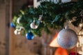 glass ball and decorations on Christmas tree ,Christmas tree garland with blue and silver balls, close-up. Perspective, blur Royalty Free Stock Photo