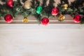 glass ball and decorations on Christmas tree.Garland with lights and red-green, gold balls on a white background Royalty Free Stock Photo