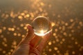 Glass ball with Golden bokeh.Holiday, glow, jewel