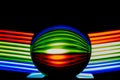 Glass ball light painting - blue green red stripes Royalty Free Stock Photo