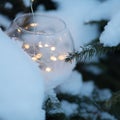 Glass ball with lights on blurred of snow square background Royalty Free Stock Photo