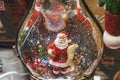 Glass ball with Santa Claus snowball gift magic decorative Royalty Free Stock Photo