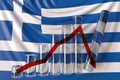 Glass bar chart with downward trend against flag of Greece. Financial crisis or economic meltdown related conceptual 3D Royalty Free Stock Photo