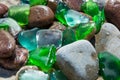 Glass beach. Natural texture with polished sea glass, stones and sand. baltic sea Royalty Free Stock Photo