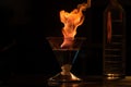 glass beaker rising from the flames of a bunsen burner Royalty Free Stock Photo