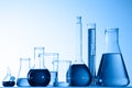 Glass beakers with blue liquid Royalty Free Stock Photo