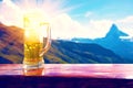 A glass of beer against the backdrop of the Matterhorn in the Swiss Alps rest, relaxation, anti-stress - concept