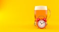 Glass of beer with alarm clock Royalty Free Stock Photo