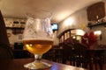 Glass with beer in bar Royalty Free Stock Photo