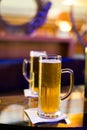 Glass of beer on bar table