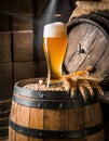 glass of beer on a barrel in a dark room