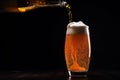 A Glass Of Beer Being Poured Into It Royalty Free Stock Photo