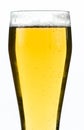 Glass of beer with foam isolated on white