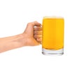 Glass of beer in man hand isolated on white Royalty Free Stock Photo