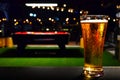 Glass of BEER on Pool Table Background Royalty Free Stock Photo