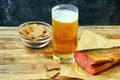 Glass of beer, smoked salmon, breadcrumbs Royalty Free Stock Photo