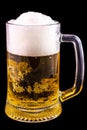 Glass with beer and a thick layer of foam with perza on a black background Royalty Free Stock Photo