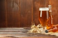 Glass beer on wood background. Close up. Royalty Free Stock Photo