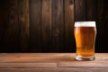 Glass beer on wood background with copy space Royalty Free Stock Photo