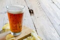 Glass beer on wood background Royalty Free Stock Photo